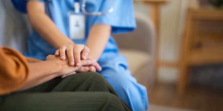 Nurse and doctor with senior patient, empathy and trust for surgery, psychology and healthcare consulting. Closeup psychologist, caregiver and volunteer support, help and hope of mental health